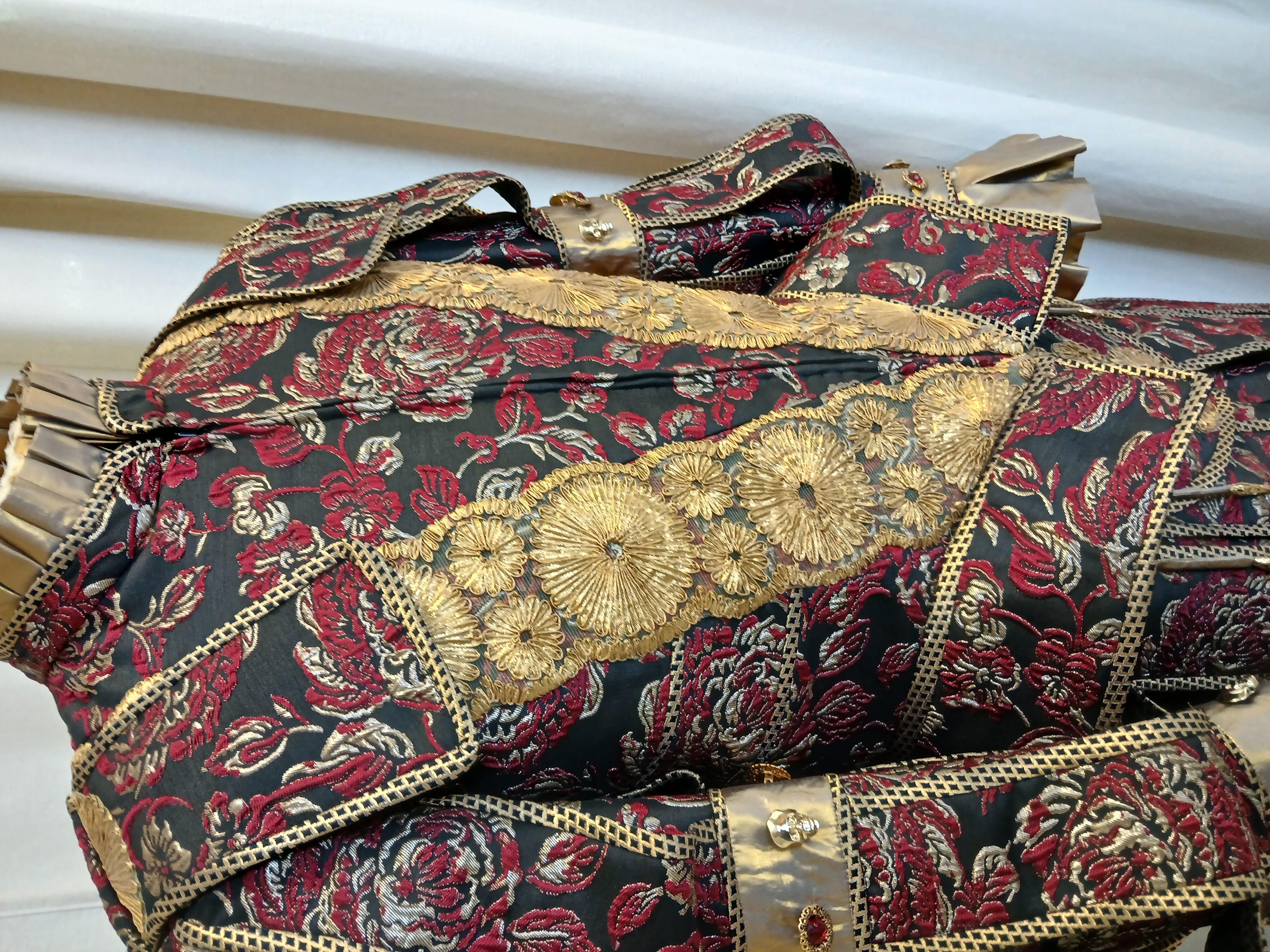 Finished masquerade coat on the dressform
