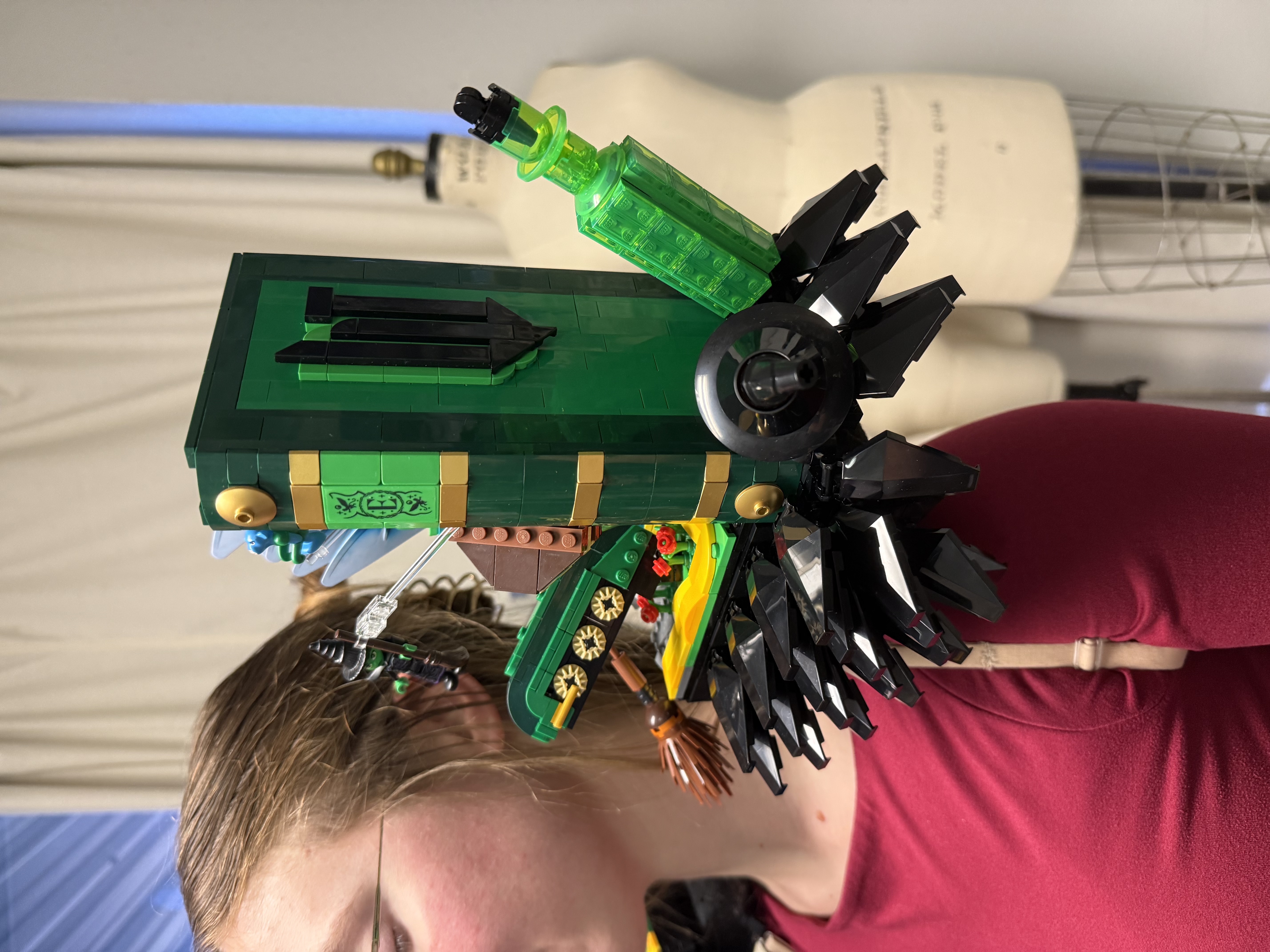 Hook & Eye team member testing LEGO epaulettes in the shop